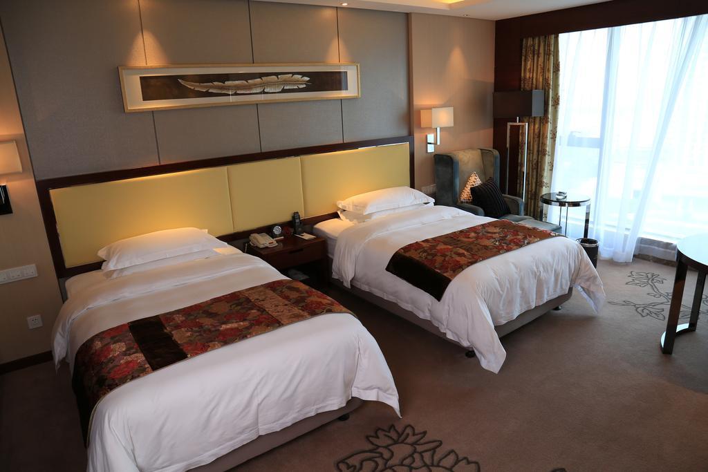 Guangzhou Changfeng Gloria Plaza Hotel Oda fotoğraf