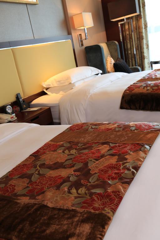 Guangzhou Changfeng Gloria Plaza Hotel Oda fotoğraf