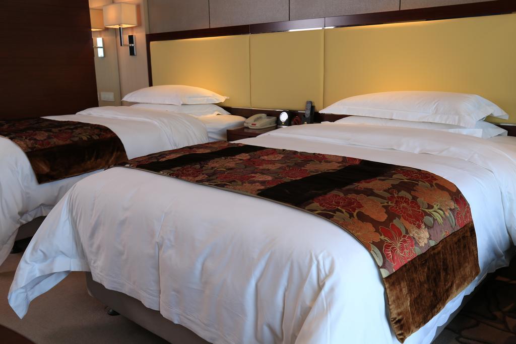 Guangzhou Changfeng Gloria Plaza Hotel Oda fotoğraf